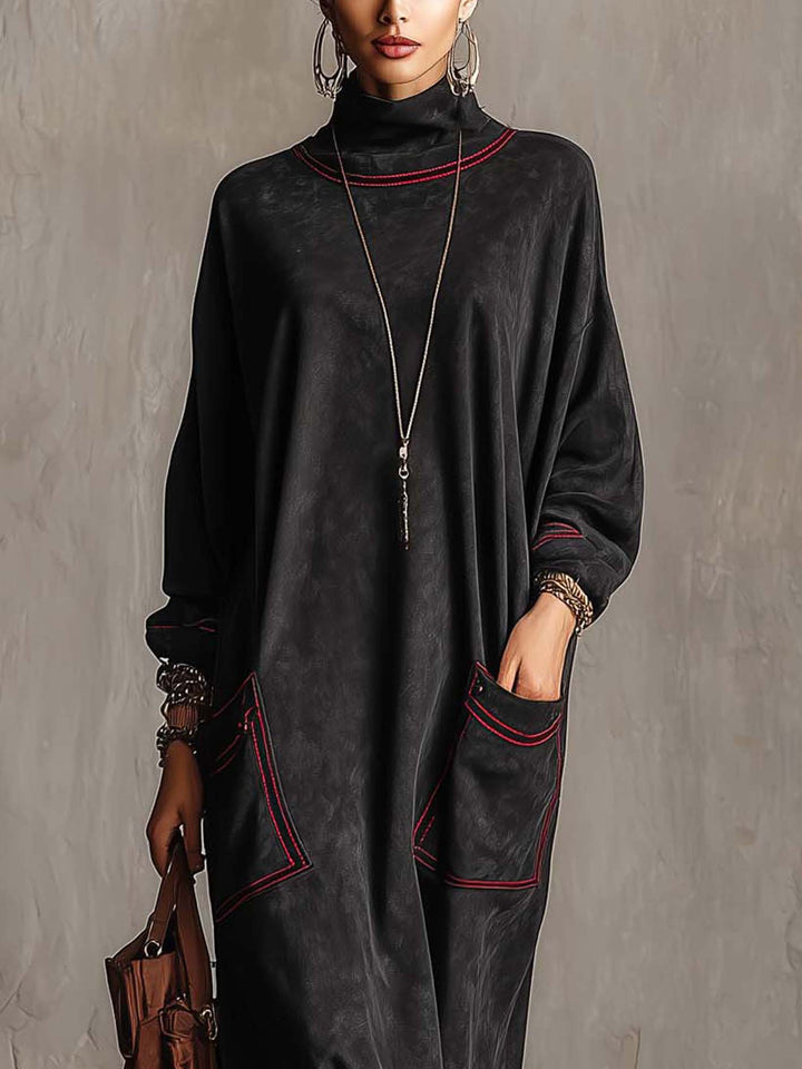 Manuela | Robe longue en daim synthétique noir avec coutures contrastantes rouges et poches plaquées