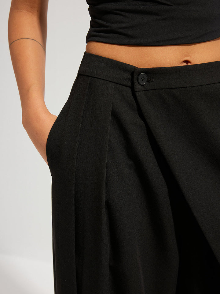 Pantalon large à superposition asymétrique