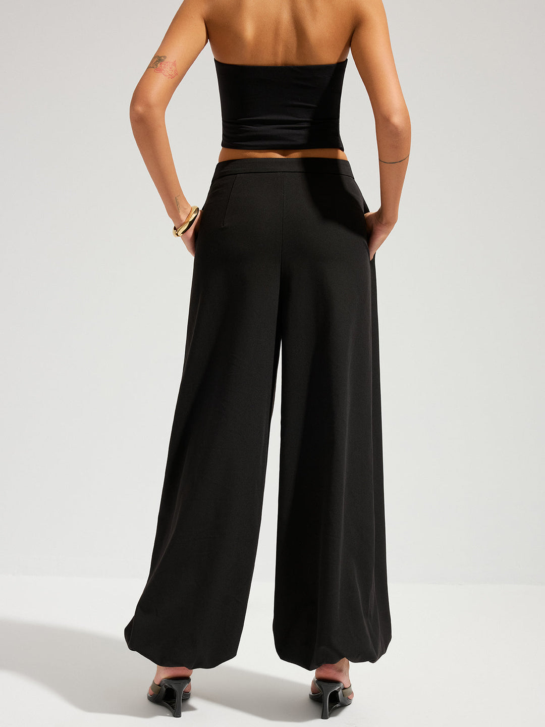 Pantalon large à superposition asymétrique