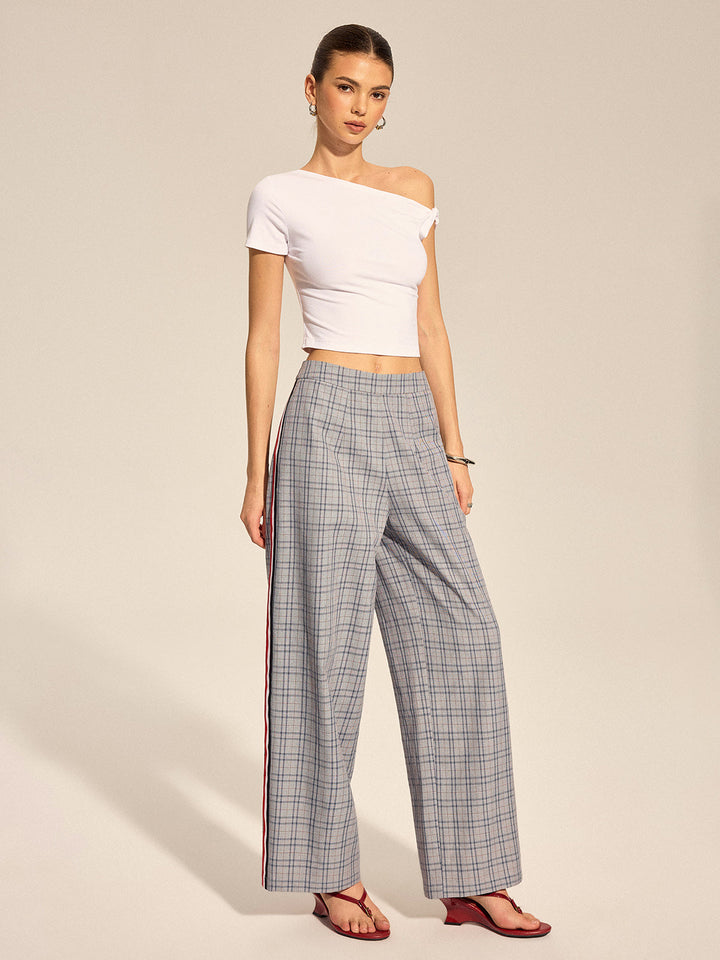 Pantalon droit à rayures latérales en tartan