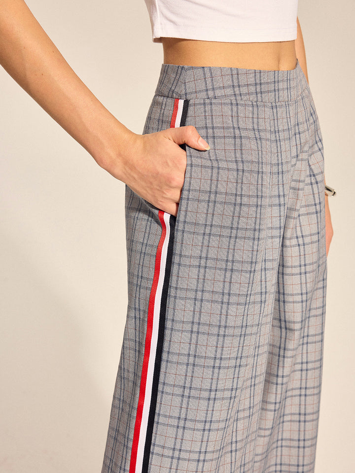 Pantalon droit à rayures latérales en tartan