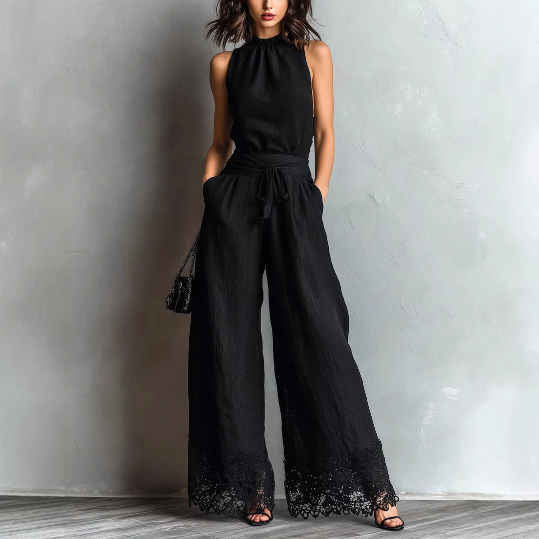 Combinaison à encolure halter avec dentelle et jambes larges ceinturée