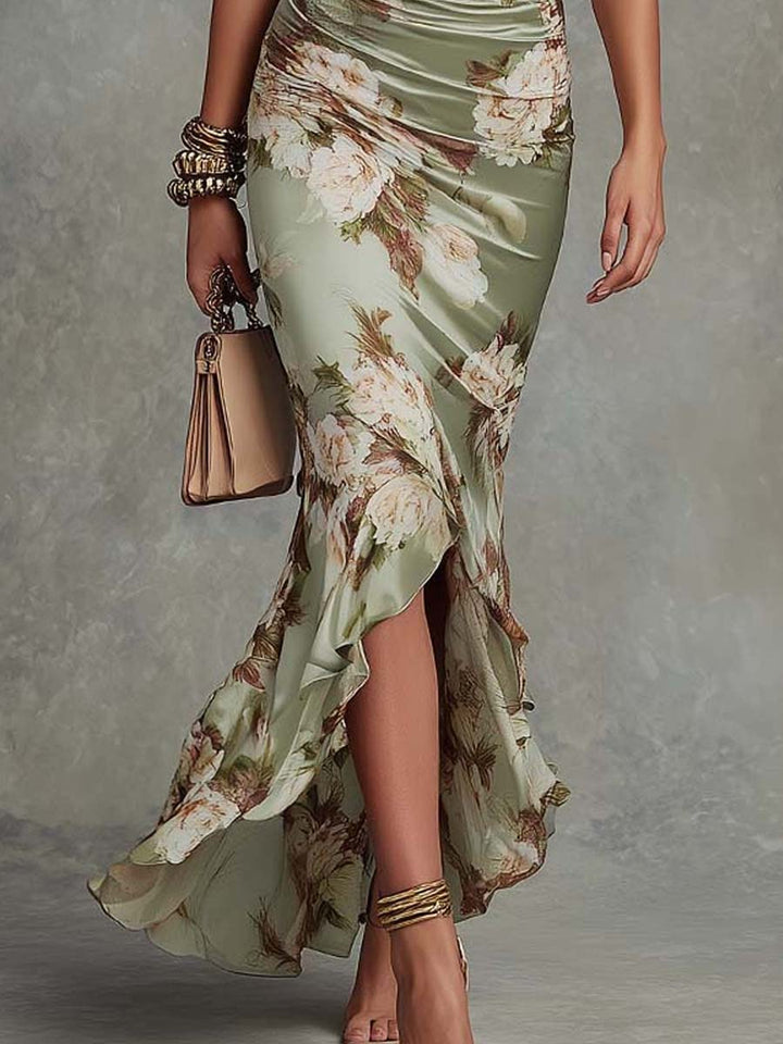 Anna - Robe longue asymétrique en satin vert avec décolleté en V, manches bouffantes évasées et motif floral