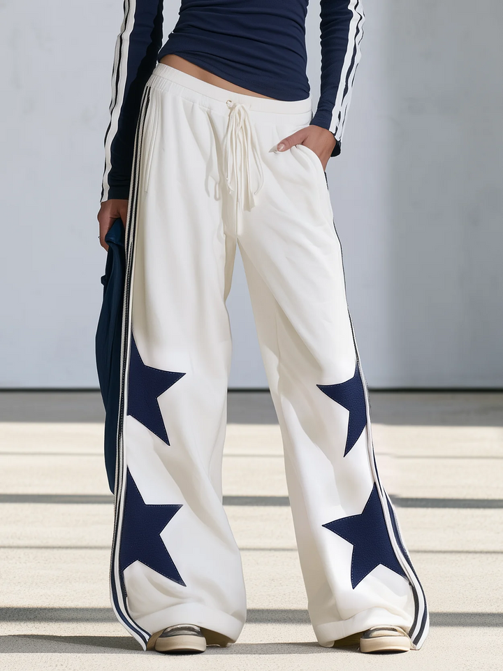 Claudia | Ensemble avec haut à manches longues imprimé d'étoiles bleu marine et pantalon à jambes larges